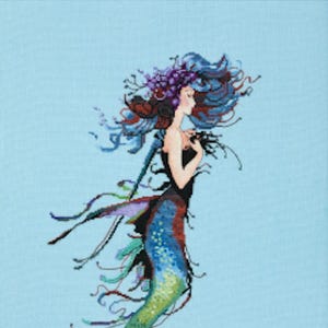 May include: A colorful mermaid with flowing blue hair and a green tail. She is wearing a black top and has a crown of purple flowers on her head. The background is a light blue.