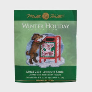 May include: A Mill Hill Winter Holiday Collection counted glass bead kit. The kit features a brown dog placing a letter in a red mailbox that reads "Letters to Santa". Finished size is 3" x 2.25" (7.6 cm x 5.7 cm).