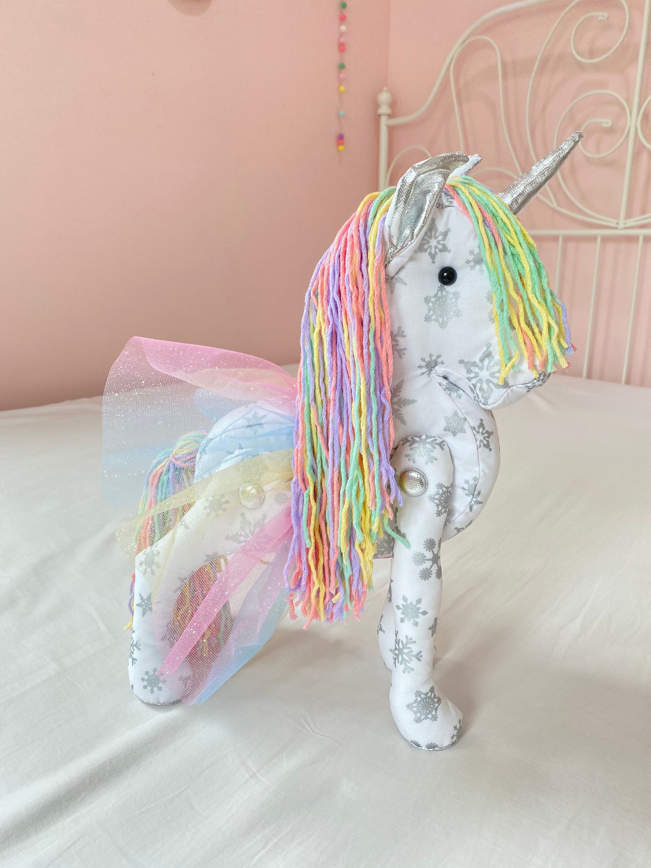 stuffed unicorn with rainbow hair