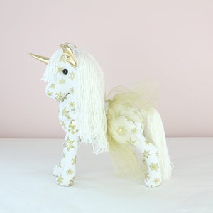 White & gold unicorn doll with gold tutu skirt, gold horn. 15" tall horse plush. "Snowy" First birthday gift. White and gold theme decor