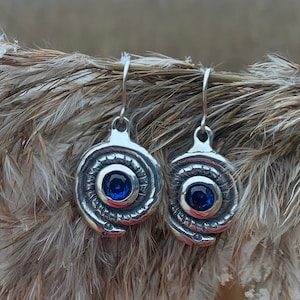 Silver grass snake earrings with blue gemstone