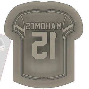 May include: A gray football jersey with the name "MOHAM" and the number "21" printed on the front.