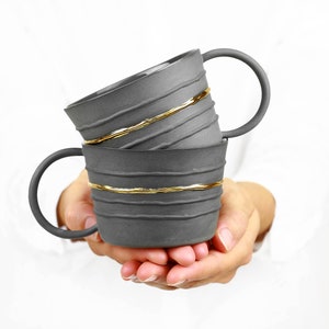 Black Gold Porcelain Mug. Handmade Ceramic Tea Mug. Porcelain Gray Mug. Coffee Lovers. Contemporary Gold Line Mug Design by CONCEPTstudio. image 1