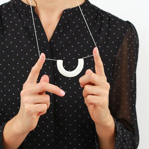 White Porcelain Jewelry  With Feminine Sound. Handcrafted Modern Openwork Necklace. Silver Chain. Geometric Pendant Design by CONCEPT studio