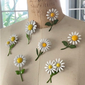 Przypinki Daisy z lat 60.
