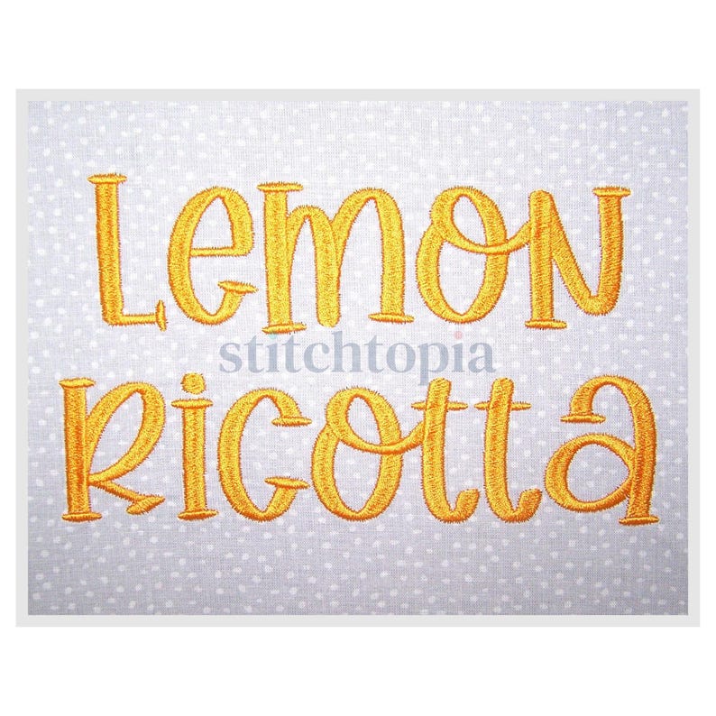 May include: Embroidered text on a white dotted background. The words "Lemon Ricotta" are stitched in a bright yellow color. The word "stitchtopia" is written in a smaller, light gray font between the two words.