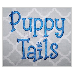Puede incluir: Texto bordado en azul sobre un fondo gris que dice "Puppy Tails".