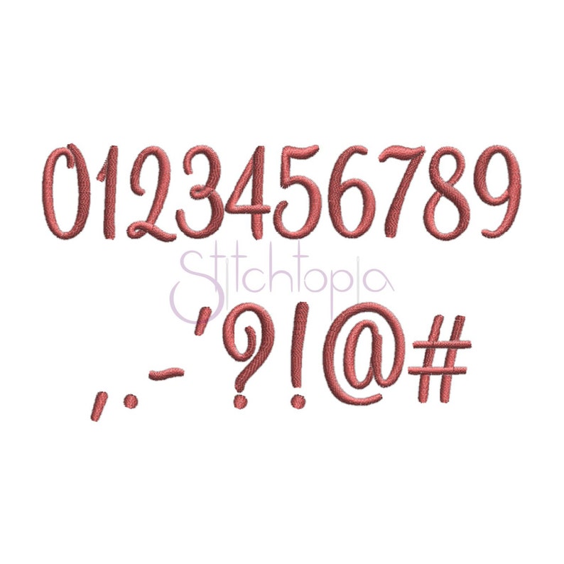 May include: A set of embroidered numbers and symbols in a script font, ranging from 0 to 9, along with punctuation marks. The numbers and symbols are in a reddish-brown color, set against a white background.