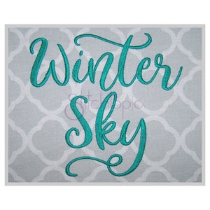 May include: Embroidered design with the text "Winter Sky" in a teal blue colour on a grey background.