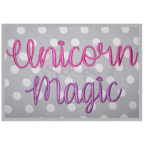 May include: Unicorn Magic embroidered design in pink and purple script lettering on a gray background with white polka dots.