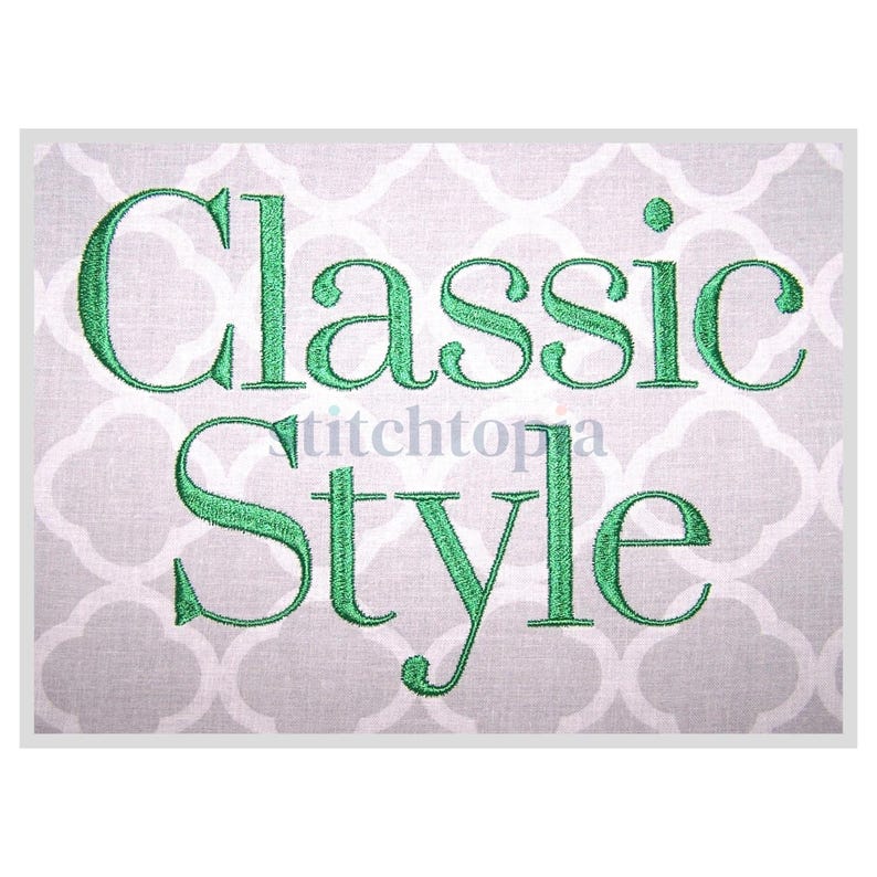 May include: Embroidered design on a white fabric background. The design reads "Classic Style" in a green font.