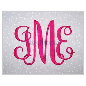 May include: A pink monogram with the letters "ME" in a cursive script font.