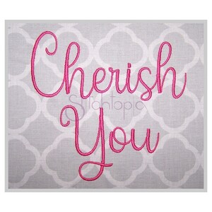 May include: Embroidered design on a gray fabric background. The design is in pink cursive lettering and reads "Cherish You".