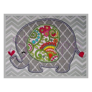 May include: A gray felt elephant applique with a colorful paisley heart design. The elephant has a small red heart on its trunk and tail.