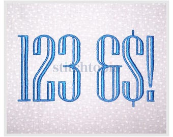 May include: Blue embroidered numbers and symbols on a white dotted fabric. The numbers "123" are followed by "CS!" in a decorative font. The image is a close-up of the embroidered design.