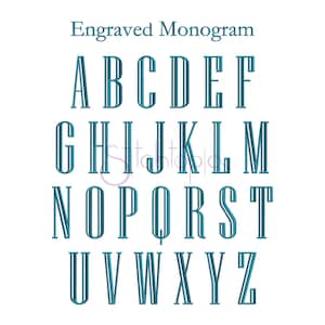 May include: Engraved Monogram alphabet in a teal blue color. The letters are in a bold, blocky font style.