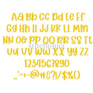 May include: Yellow, handwritten-style alphabet, numbers, and symbols on a white background. The letters are in uppercase and lowercase, with numbers 0-9 and various punctuation marks and symbols.