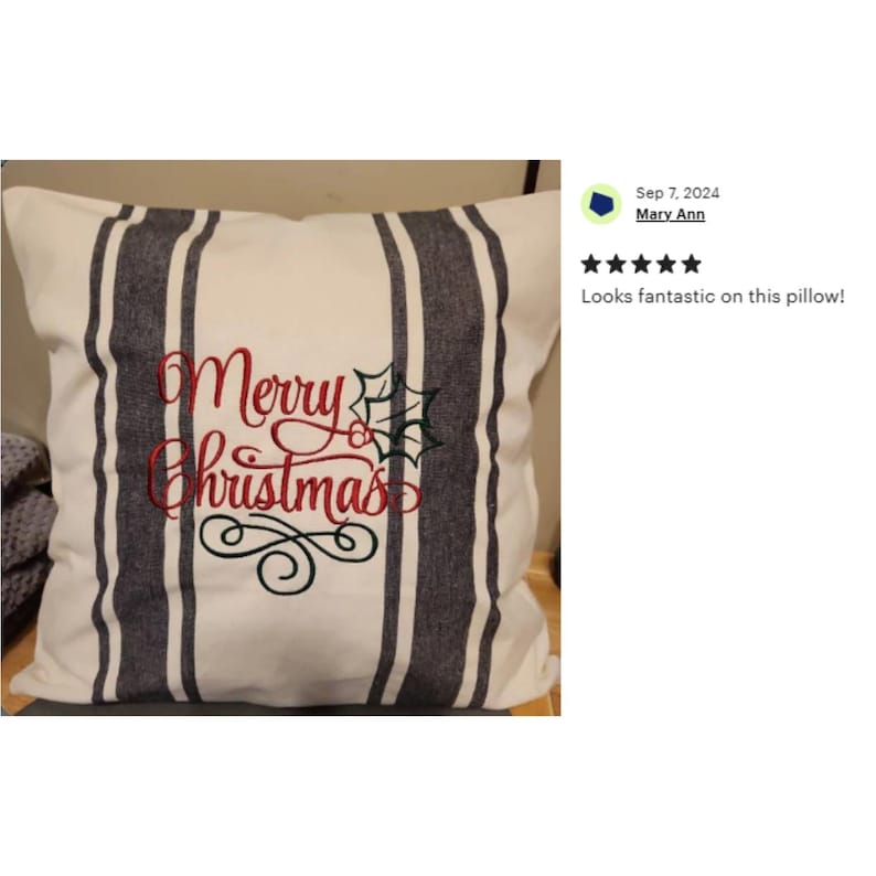May include: White pillow with black stripes and the text "Merry Christmas" embroidered in red and green.