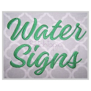 May include: Green embroidered text on a white fabric background that reads "Water Signs".