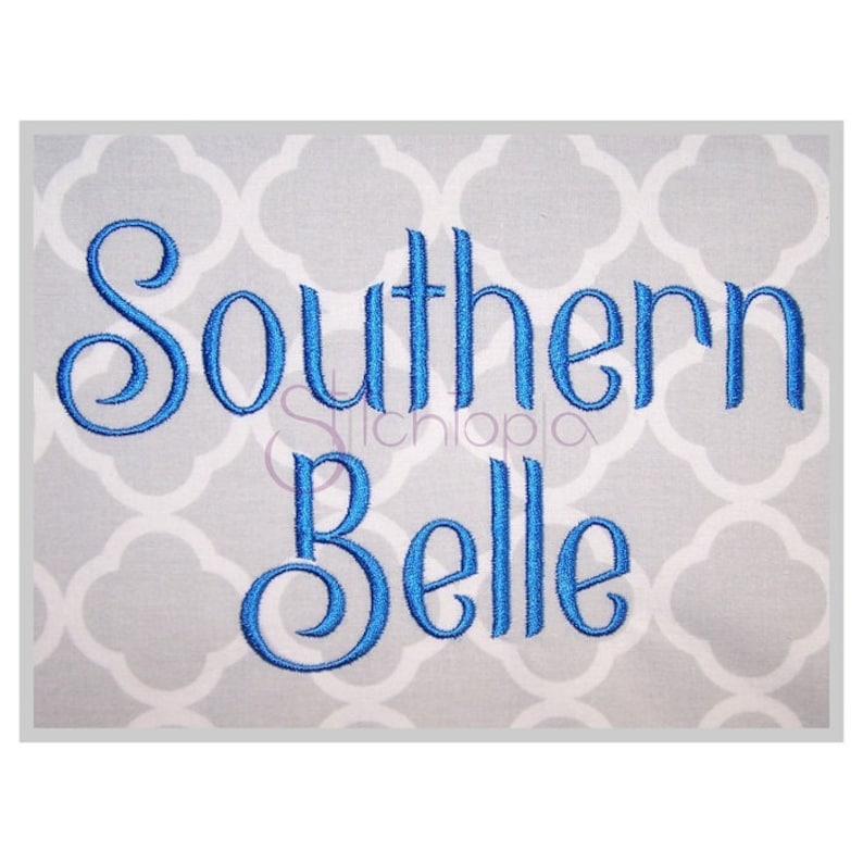 May include: Embroidered design featuring the words "Southern Belle" in a blue cursive font.