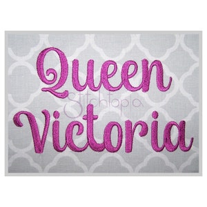 May include: Embroidered design of "Queen Victoria" in a cursive font, with the word "Queen" in a larger font size than "Victoria". The embroidery is in a bright pink colour on a grey background.