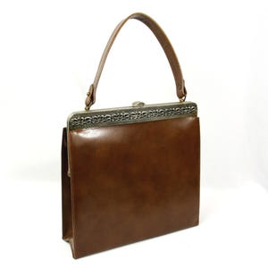 Vintage Kunstleder Metall Swirl Top Griff Handtasche Taschenbuch Geldbörse Kelly Bag Mod Brown 1960er Jahre