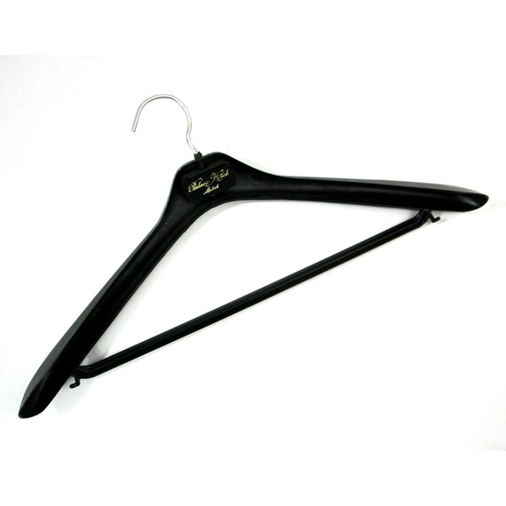 Percha de plástico vintage para abrigos, trajes y prendas de