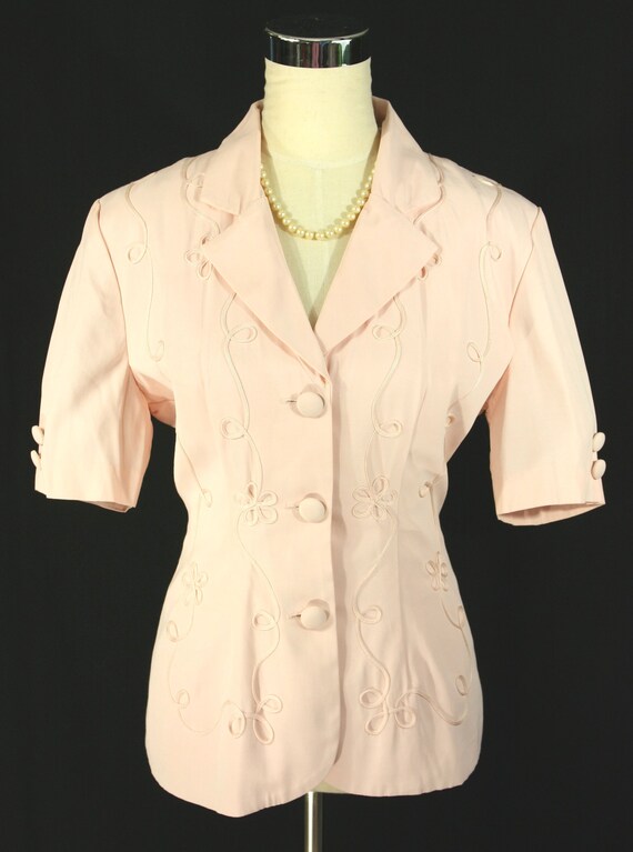 pink short sleeve jacket