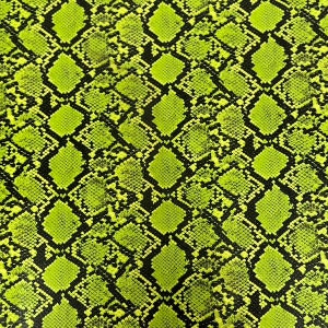 May include: A green and black snakeskin pattern fabric. The fabric has a repeating pattern of green scales on a black background.