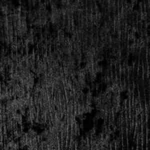 May include: Black velvet fabric with a textured, slightly raised pattern. The fabric has a soft, luxurious feel.