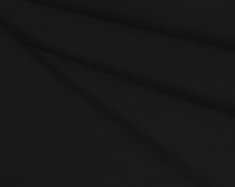 May include: A close-up of a black fabric with a smooth texture and subtle folds.