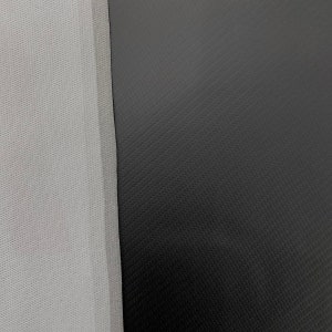 May include: Close-up of a gray textured fabric next to a black textured fabric.