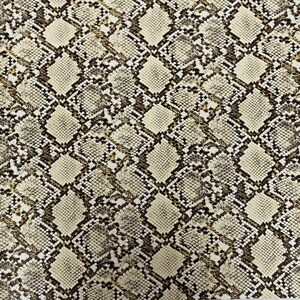 May include: A close-up of a beige and brown snakeskin pattern fabric. The fabric has a repeating pattern of diamond shapes with a textured surface.