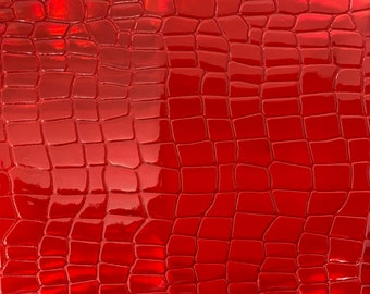 Tela de vinilo rojo iridiscente de imitación de cocodrilo para tapicería. Se vende cortada a medida. 56"