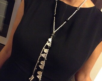 Ethiopian Channel type ethnic necklace,antique high silver handmade beads, antique silver telsums and old black eye beads. Boho jewelry