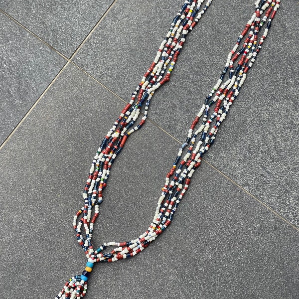 Ethiopia, Antique beaded protective necklace form the 1930s, Bohemian glass beads 1930s  5 strings, and a tassle.  The tassle is important.