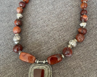Necklace, Afghan Carnelian pendant. Old hand carved Tibet Carnelians beads, Center pcs. Indian. Silver Ethiopian spacers beads & Asian beads