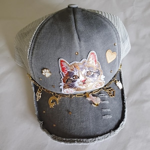 NEW! Glam Kitty Patch Trucker Hat with Gold Charm Chain Custom Glam Junk Trucker Hat Creation Process | TikTok main image 4