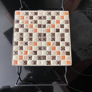 MCM mosaic tile trivet.