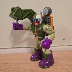 Vintage 1997 fisher price action figure