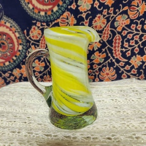 Hand blown small glass pitcher