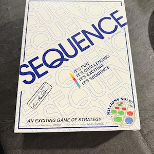 May include: A white board game box with the word "SEQUENCE" in large blue letters. The box also features the text "IT'S FUN, IT'S CHALLENGING, IT'S EXCITING, IT'S SEQUENCE" and "AN EXCITING GAME OF STRATEGY".