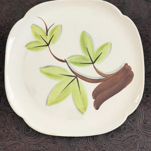 vintage ceramic plate is a "Woodleaf" serving platter manufactured by Continental Kilns.