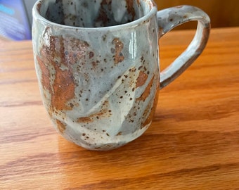 Hand thrown glazed pottery mug