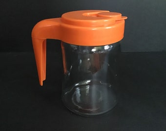 Cute orange pitcher.