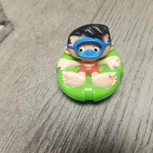 Vintage 1994 McDonalds Toy Green Inner Tube Bobbys World Kids Happy Meal Toy