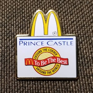 Pin de esmalte vintage del castillo del príncipe de McDonald&#39;s en la esquina y la vuelta al mundo