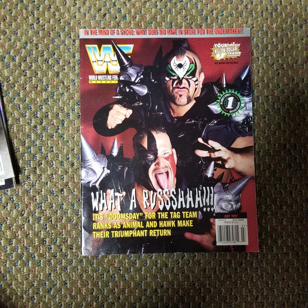 WWF Magazine July 1997 Animal and Hawk Cover