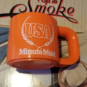 Vintage plastic Minute Maid-mok uit de VS