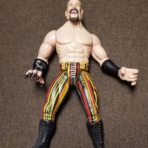 KURRGAN Jakks Pacific 1998 WWE Wrestling Figure WWF Oddities/Interrogator Tiedye